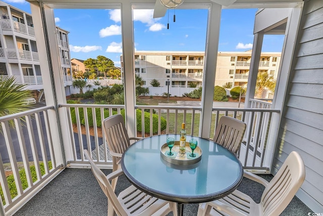 balcony featuring outdoor dining space