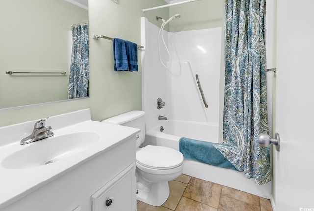 bathroom featuring toilet, shower / tub combo, and vanity