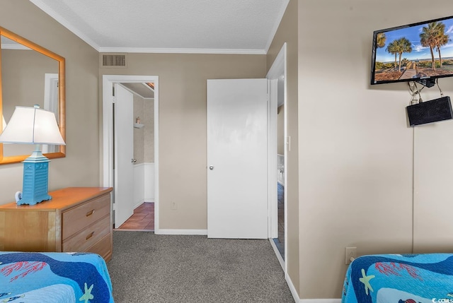 bedroom with carpet, ornamental molding, baseboards, and ensuite bathroom