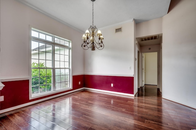 638 Hatteras River Rd, Myrtle Beach, SC 29588 - spare room featuring healthy amount of natural light, a chandelier, crown molding, hardwood / wood-style floors, and baseboards