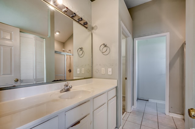 638 Hatteras River Rd, Myrtle Beach, SC 29588 - full bathroom featuring tile patterned flooring, vanity, baseboards, and a shower