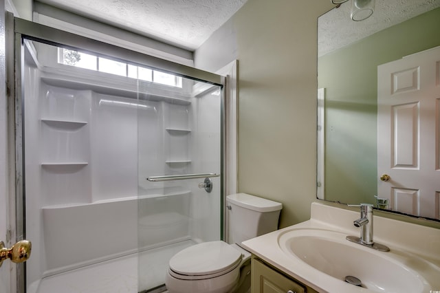 638 Hatteras River Rd, Myrtle Beach, SC 29588 - full bath featuring a textured ceiling, toilet, a stall shower, and vanity
