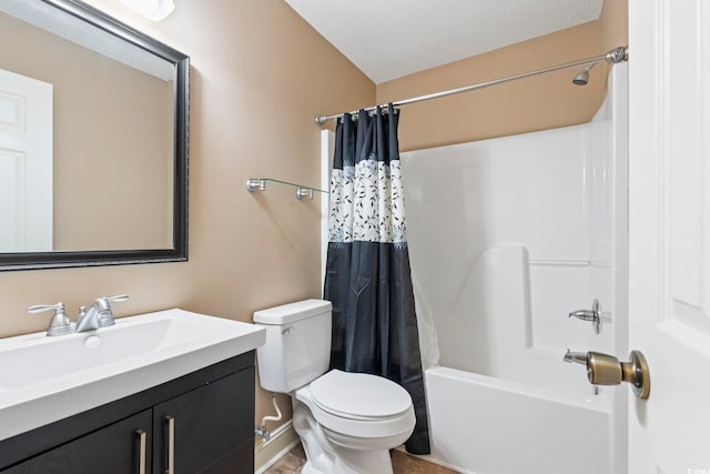 bathroom with toilet, shower / bathtub combination with curtain, and vanity