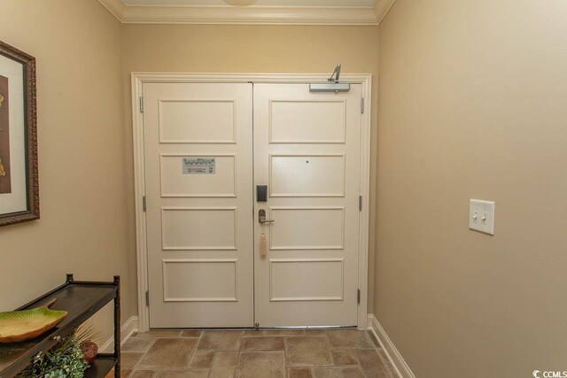 100 N Beach Blvd Unit 1902, North Myrtle Beach, SC 29582 - doorway featuring crown molding, stone finish floors, and baseboards