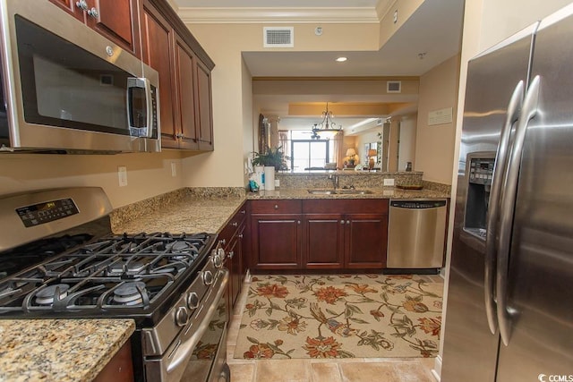 100 N Beach Blvd Unit 1902, North Myrtle Beach, SC 29582 - kitchen featuring stainless steel appliances, a sink, crown molding, light stone countertops, and a chandelier