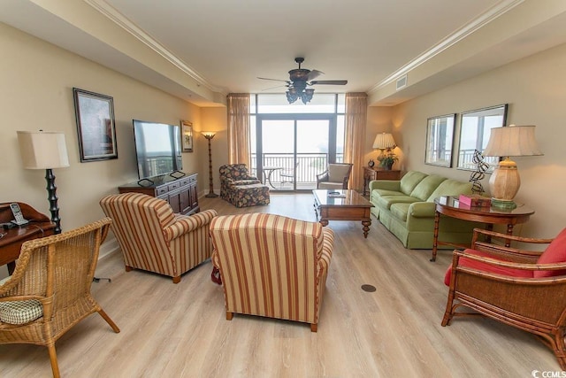 100 N Beach Blvd Unit 1902, North Myrtle Beach, SC 29582 - living area featuring light wood-type flooring, ornamental molding, plenty of natural light, floor to ceiling windows, and a ceiling fan