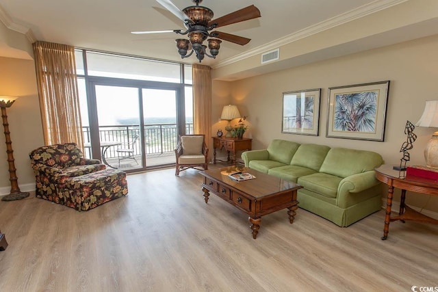 100 N Beach Blvd Unit 1902, North Myrtle Beach, SC 29582 - living area featuring ceiling fan, crown molding, a wall of windows, wood finished floors, and baseboards