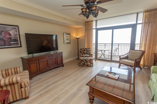 100 N Beach Blvd Unit 1902, North Myrtle Beach, SC 29582 - living area featuring ceiling fan, ornamental molding, light wood-style floors, and baseboards