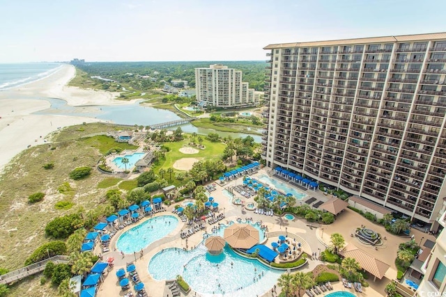 100 N Beach Blvd Unit 1902, North Myrtle Beach, SC 29582 - bird's eye view of a pool, a nearby body of water, and apartment complex / building