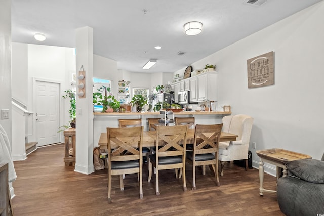 160 Cart Crossing Dr Unit 104, Conway, SC 29526 - dining space with dark wood-style flooring and baseboards