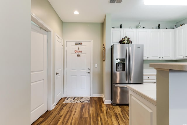 260 Woodlands Way Unit 2, Calabash, NC 28467 - kitchen featuring stainless steel refrigerator with ice dispenser, dark wood-type flooring, white cabinets, recessed lighting, and light countertops