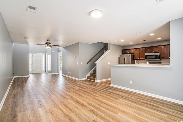 1196 Harvester Cir Unit 1196, Myrtle Beach, SC 29579 - unfurnished living room featuring baseboards, light wood-type flooring, recessed lighting, and ceiling fan