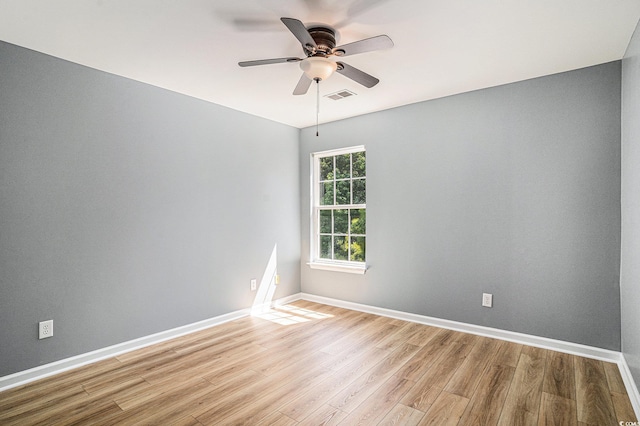 1196 Harvester Cir Unit 1196, Myrtle Beach, SC 29579 - empty room with light wood finished floors, a ceiling fan, and baseboards