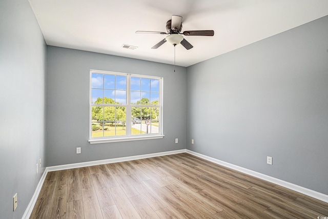 1196 Harvester Cir Unit 1196, Myrtle Beach, SC 29579 - unfurnished room with wood finished floors, a ceiling fan, and baseboards