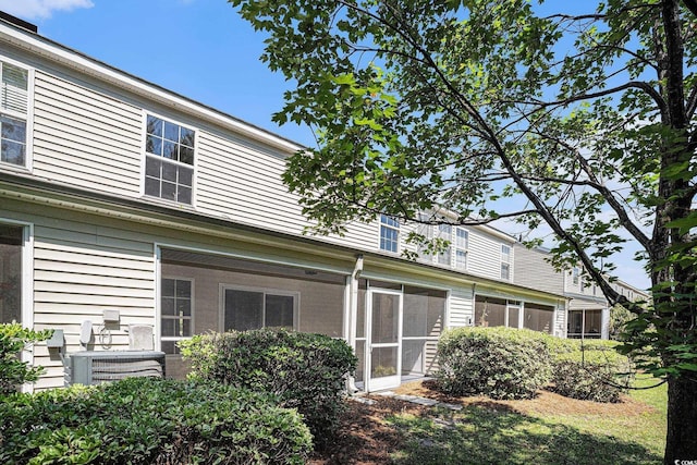 1196 Harvester Cir Unit 1196, Myrtle Beach, SC 29579 - rear view of house featuring a sunroom