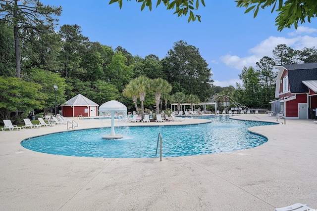 1196 Harvester Cir Unit 1196, Myrtle Beach, SC 29579 - community pool featuring a patio and fence