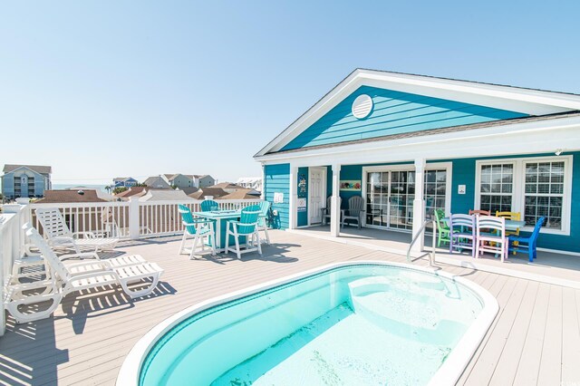 163 Cypress Ave, Murrells Inlet, SC 29576 - view of pool with outdoor dining area and a wooden deck