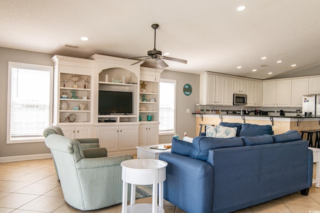 163 Cypress Ave, Murrells Inlet, SC 29576 - living room featuring recessed lighting, light tile patterned floors, ceiling fan, baseboards, and lofted ceiling