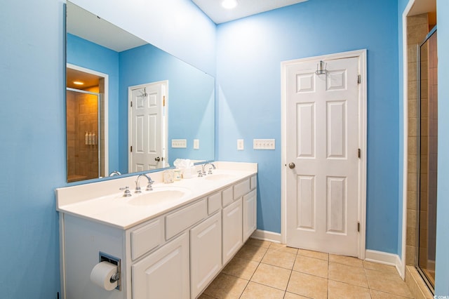 163 Cypress Ave, Murrells Inlet, SC 29576 - full bathroom with tile patterned flooring, a tile shower, double vanity, and baseboards