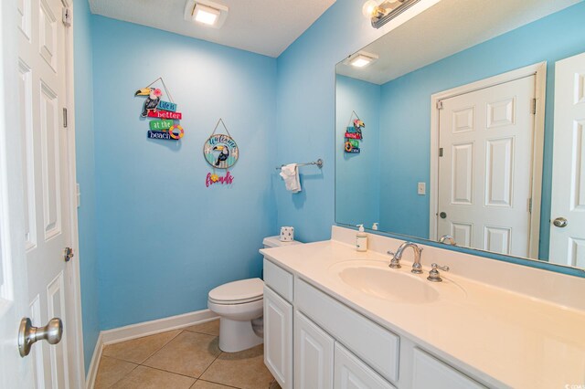 163 Cypress Ave, Murrells Inlet, SC 29576 - bathroom with tile patterned floors, baseboards, vanity, and toilet