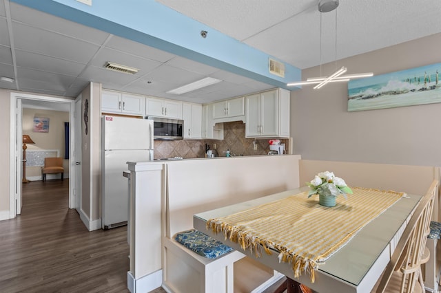 202 74th Ave N Unit 2547/2548, Myrtle Beach, SC 29572 - dining room featuring dark wood-style floors and baseboards
