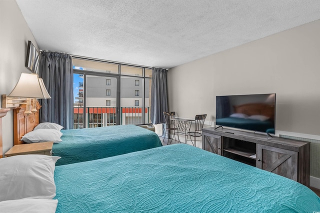 202 74th Ave N Unit 2547/2548, Myrtle Beach, SC 29572 - bedroom featuring a textured ceiling