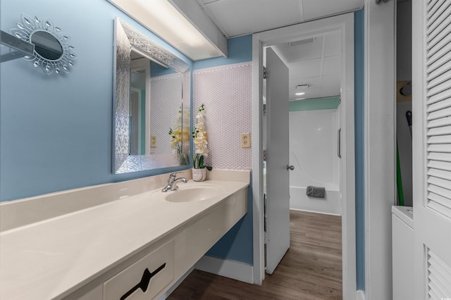 202 74th Ave N Unit 2547/2548, Myrtle Beach, SC 29572 - full bath with wood finished floors, vanity, and baseboards