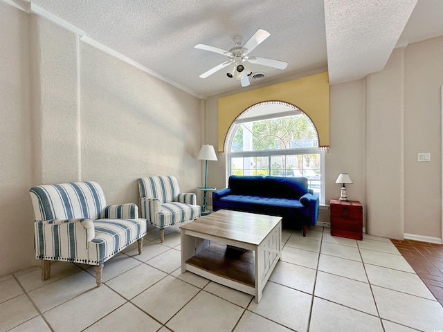 500 23rd Ave S, North Myrtle Beach, SC 29582 - living area featuring a textured ceiling, light tile patterned floors, and ceiling fan