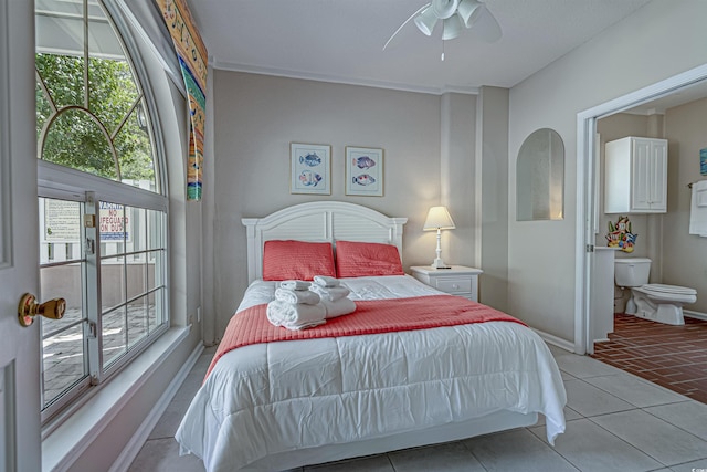 500 23rd Ave S, North Myrtle Beach, SC 29582 - tiled bedroom featuring ceiling fan and baseboards