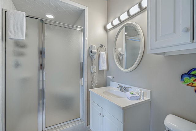 500 23rd Ave S, North Myrtle Beach, SC 29582 - full bath featuring a stall shower, vanity, and toilet