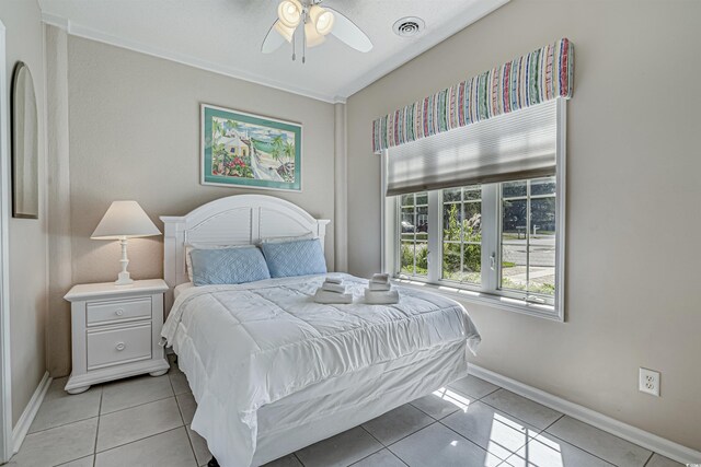 500 23rd Ave S, North Myrtle Beach, SC 29582 - bedroom with light tile patterned flooring, baseboards, and a ceiling fan