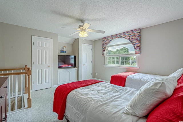 500 23rd Ave S, North Myrtle Beach, SC 29582 - bedroom with carpet flooring, a textured ceiling, baseboards, and ceiling fan