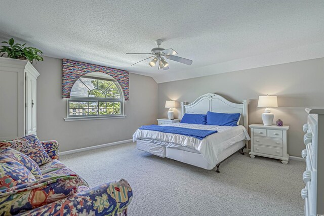 500 23rd Ave S, North Myrtle Beach, SC 29582 - carpeted bedroom with a textured ceiling, ceiling fan, and baseboards