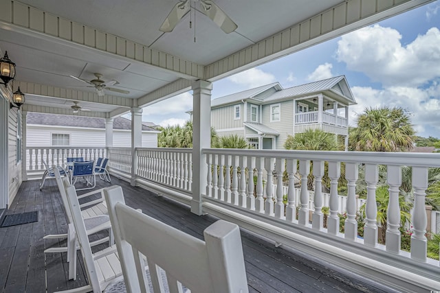 500 23rd Ave S, North Myrtle Beach, SC 29582 - wooden terrace with a ceiling fan and outdoor dining space