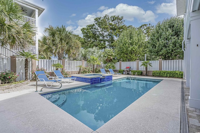 500 23rd Ave S, North Myrtle Beach, SC 29582 - view of pool with a patio, a fenced backyard, and a pool with connected hot tub