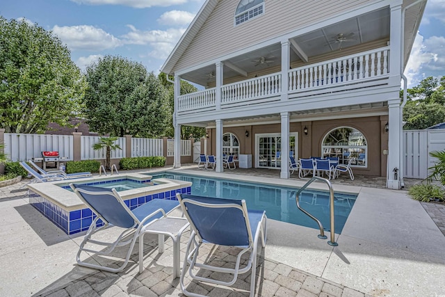 500 23rd Ave S, North Myrtle Beach, SC 29582 - view of pool featuring an in-ground hot tub, a ceiling fan, and a patio area