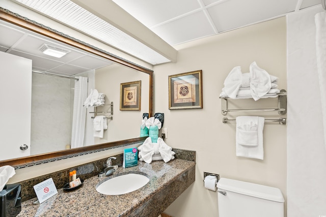 1105 S Ocean Blvd Unit 1048, Myrtle Beach, SC 29577 - bathroom featuring toilet, vanity, and a shower with shower curtain