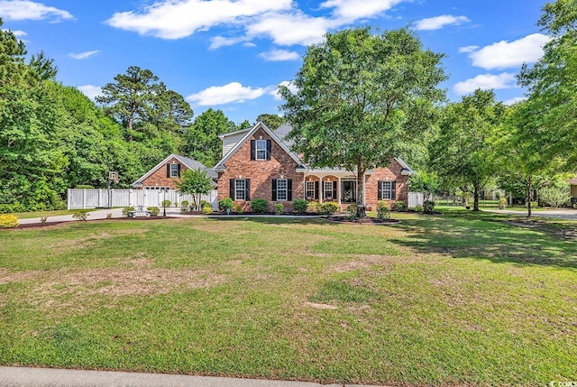 traditional-style home featuring brick siding