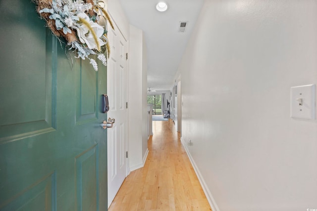 69 Pinehurst Ln Unit 3-F, Pawleys Island, SC 29585 - hallway with light wood-style flooring, baseboards, and recessed lighting