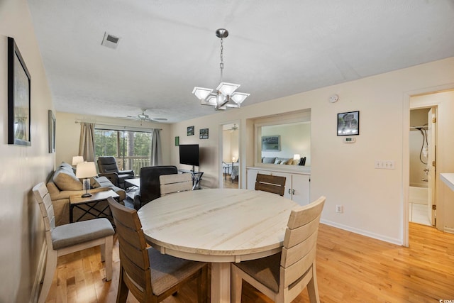 69 Pinehurst Ln Unit 3-F, Pawleys Island, SC 29585 - dining area featuring light wood finished floors, a ceiling fan, and baseboards