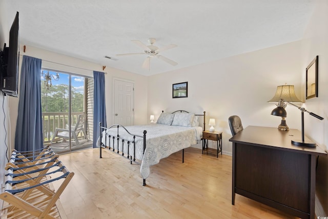 69 Pinehurst Ln Unit 3-F, Pawleys Island, SC 29585 - bedroom featuring access to exterior, light wood-type flooring, a desk, baseboards, and ceiling fan