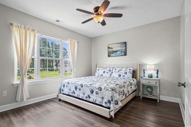 4933 Crab Pond Ct Unit 201, Myrtle Beach, SC 29579 - bedroom with wood finished floors, baseboards, and ceiling fan
