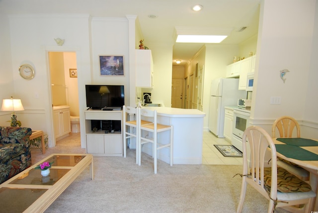 400 Lands End Blvd Unit 5304, Myrtle Beach, SC 29572 - living room featuring light carpet, ornamental molding, recessed lighting, and light tile patterned floors