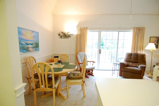 400 Lands End Blvd Unit 5304, Myrtle Beach, SC 29572 - dining space featuring light carpet and a wainscoted wall