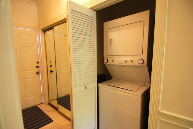 400 Lands End Blvd Unit 5304, Myrtle Beach, SC 29572 - laundry area featuring stacked washer / dryer and light tile patterned floors