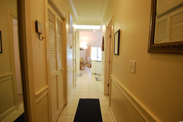 400 Lands End Blvd Unit 5304, Myrtle Beach, SC 29572 - hallway featuring light tile patterned floors and ornamental molding