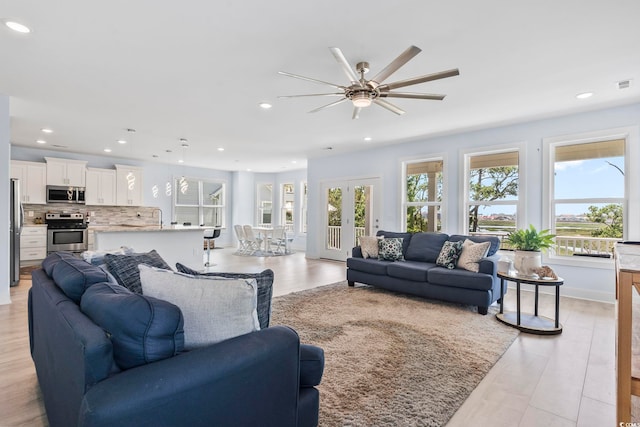 400 Elizabeth Dr, Murrells Inlet, SC 29576 - living room with a ceiling fan, light wood finished floors, and recessed lighting