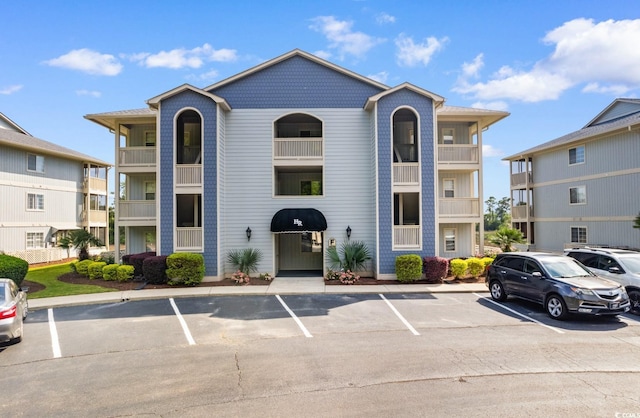 4520 Coquina Harbour Dr Unit F-3, Little River, SC 29566 - view of property with uncovered parking