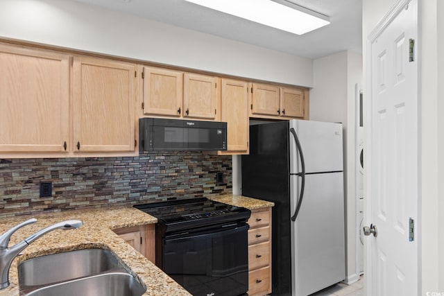 4520 Coquina Harbour Dr Unit F-3, Little River, SC 29566 - kitchen featuring black appliances, light brown cabinets, tasteful backsplash, and light stone counters