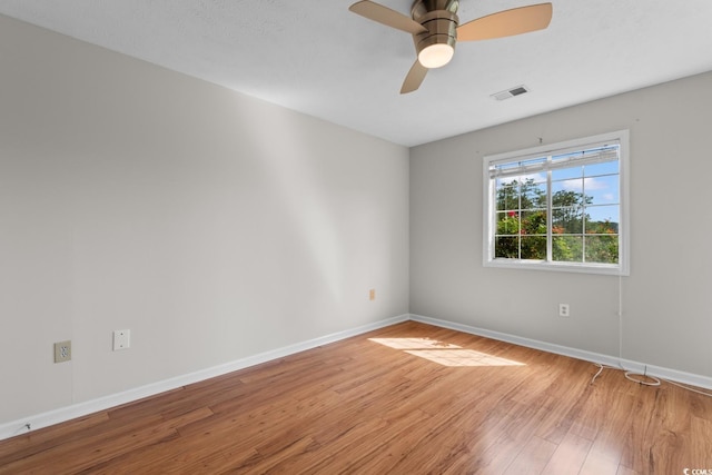 4520 Coquina Harbour Dr Unit F-3, Little River, SC 29566 - spare room featuring wood finished floors and a ceiling fan